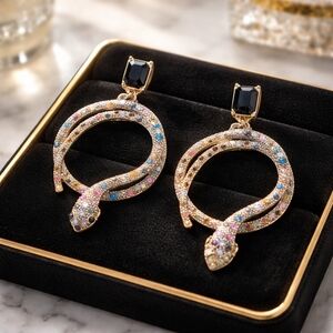 Elegant Snake Design Earrings with Black and Purple Accents